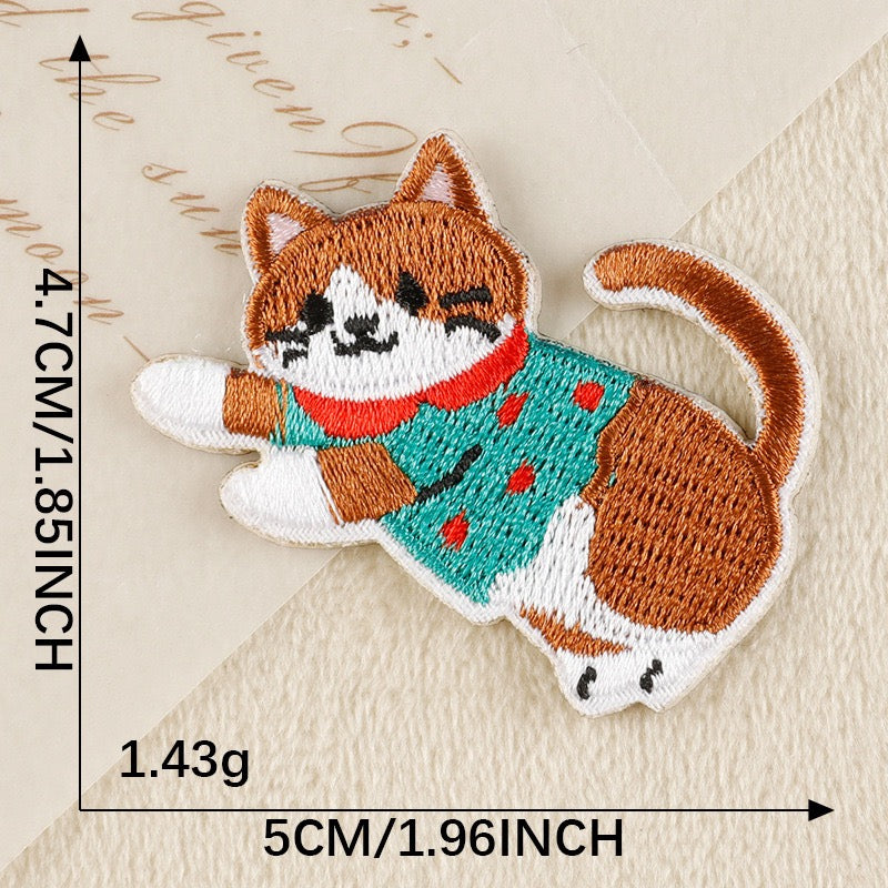 playful calico cat in teal vest whimsical embroidered stick-on patch