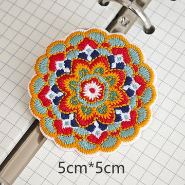 Layered floral rosette embroidered stick-on patch with rounded petals
