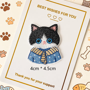 tuxedo cat in blue scarf embroidered stick-on patch — blue eyes blue and yellow striped scarf