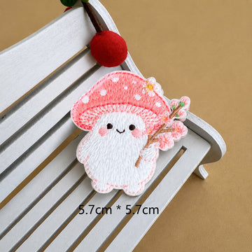 cherry blossom mushroom baby embroidered stick-on patch — pink spotted cap holding cherry blossom branch
