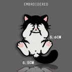 peek-a-boo tuxedo cat covering eyes with paws embroidered patch