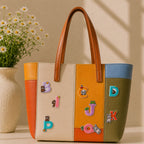 cute bear bunny frog raccoon and otter letter patches B C D I J K O P decorating a bold multicolor leather handbag