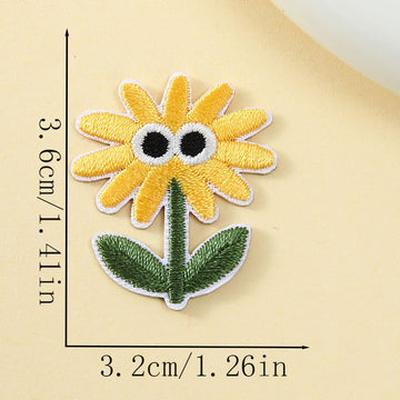 wide-eyed golden sunflower googly eyes embroidered stick-on patch