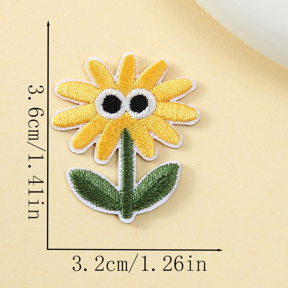 wide-eyed golden sunflower googly eyes embroidered stick-on patch