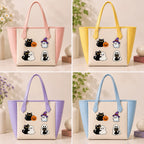 four cute Halloween embroidered stick-on patches on tote bag — ghost hugging black cat black cat with pumpkin ghost in witch hat kawaii Halloween style