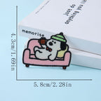 dog relaxing on pink sofa with green beanie embroidered stick-on patch