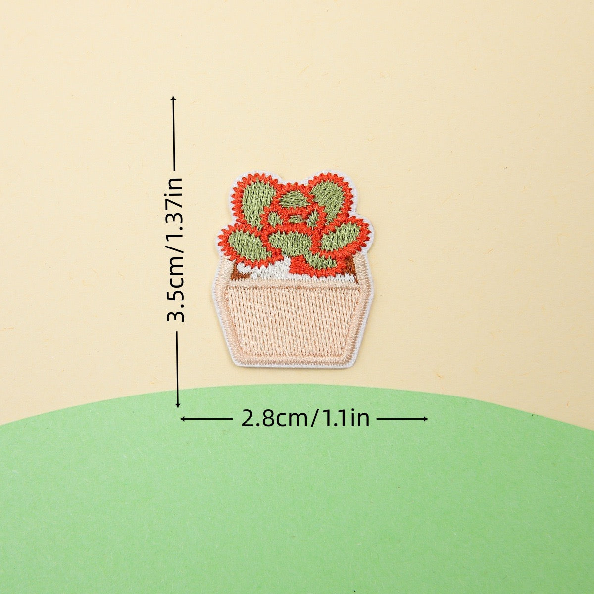 beige pot rosette succulent embroidered stick-on patch — tight spiral of green and red leaves