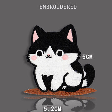 sitting tuxedo cat with round eyes embroidered stick-on patch