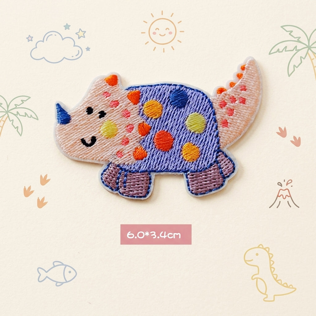 blue spotted Triceratops kawaii embroidered stick-on patch — round wide blue purple triceratops covered in large multicolored polka dots with blue horn
