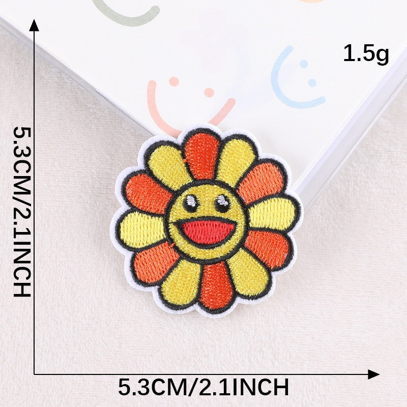 sunset yellow and orange smiley flower embroidered stick-on patch