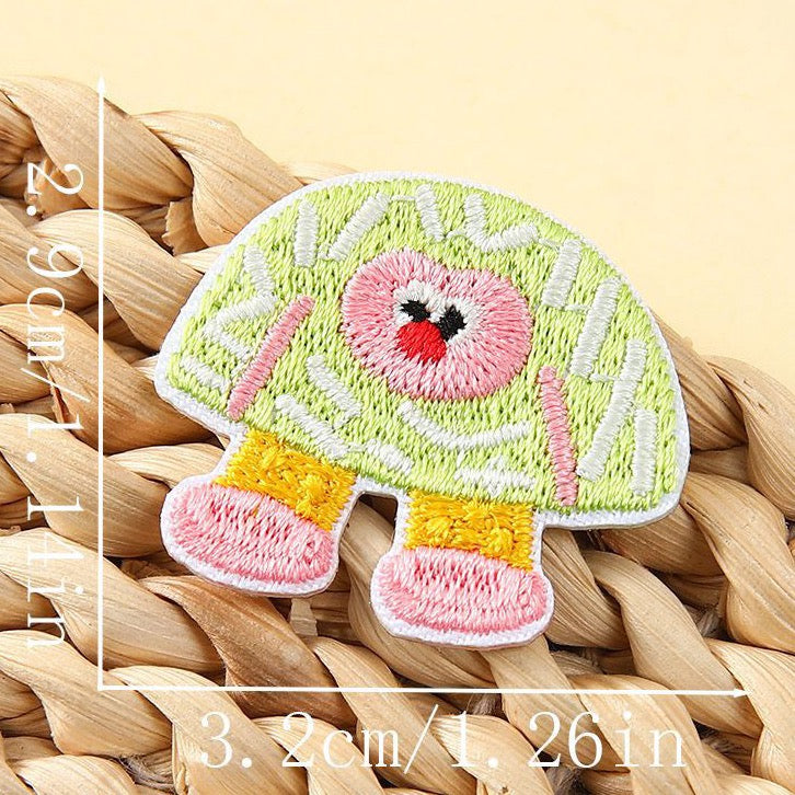 pink-faced green mushroom abstract groovy embroidered stick-on patch
