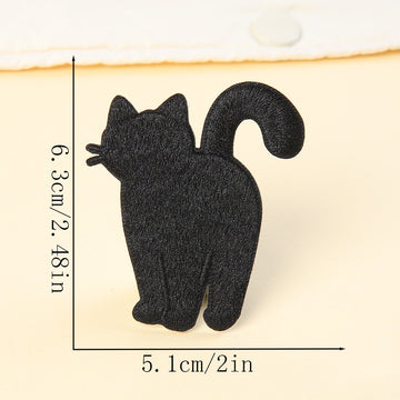 standing back view black cat embroidered stick-on patch — tail raised walking away
