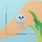 blue jellyfish embroidered stick-on patch — soft dome with pink tentacles and big eyes
