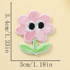 surprised pink blossom googly eyes embroidered stick-on patch