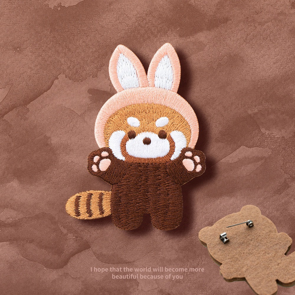 Embroidered Pins of a Full Body Cute Red Panda in a Hat