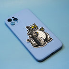 cat godzilla stick-on patch on a phone case