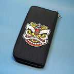 chinese fortune lion dance embroidered stick-on patch on a wallet