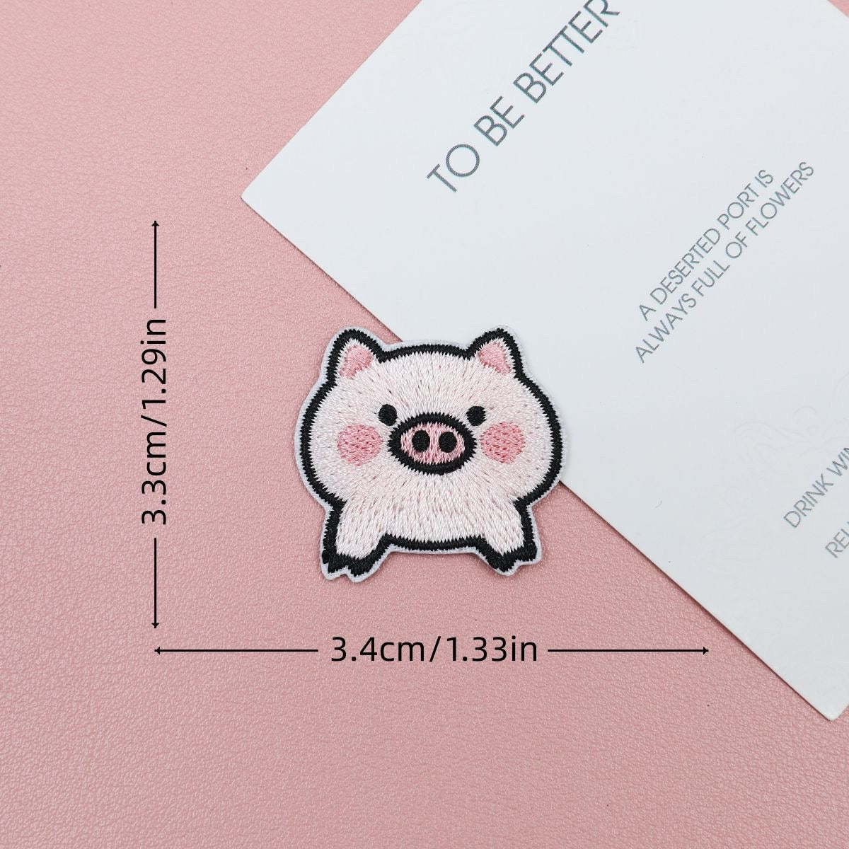 Standing pink piglet embroidered stick-on patch with pointed ears and a round snout
