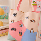 shiba westie jack russell beagle bulldog doberman and hound puppy portrait stick-on patches scattered on a pink and cream wave color-block leather handbag