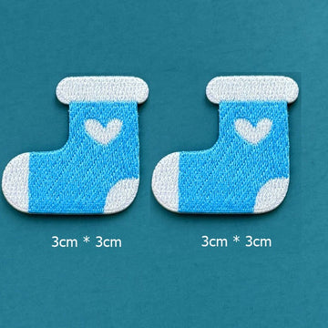 sky blue heart stocking embroidered stick-on patches — pair of bright sky blue stockings with white cuff white heart and white toe 30x30mm