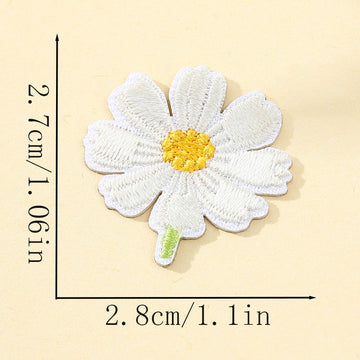 white cosmos flower with yellow center embroidered stick-on patch