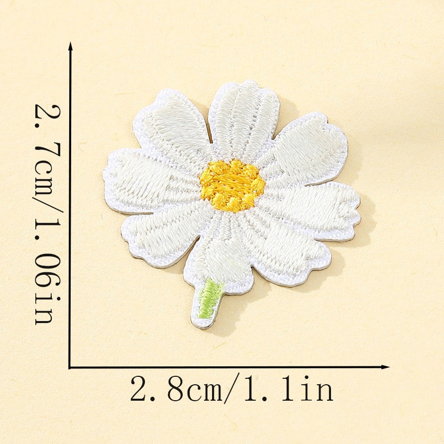 white cosmos flower with yellow center embroidered stick-on patch