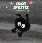 soot sprite crawling with armful of colorful stars embroidered patch