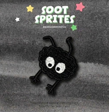soot sprite crawling with armful of colorful stars embroidered patch