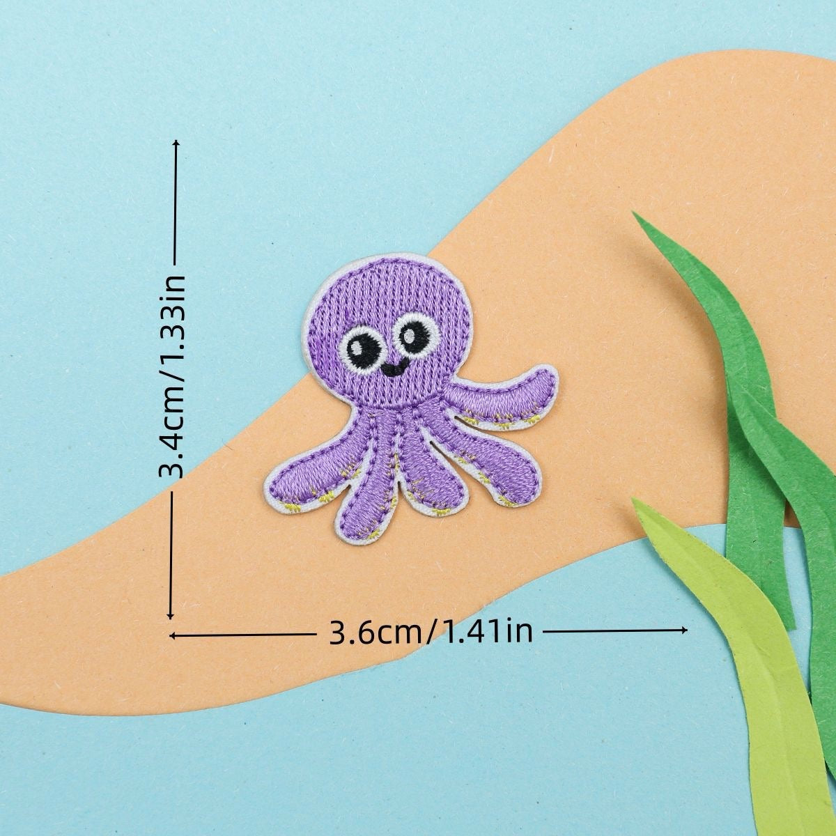purple octopus embroidered stick-on patch — eight legs spreading round head