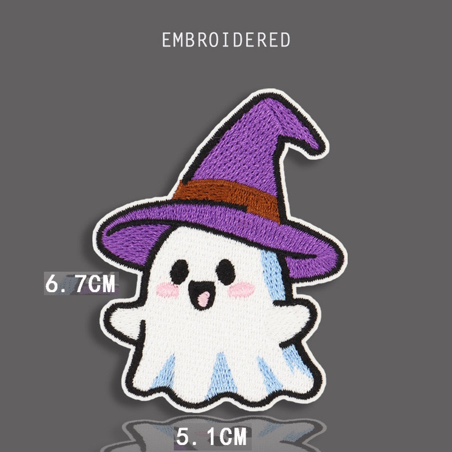 ghost in witch hat embroidered stick-on patch — small round white kawaii ghost wearing purple witch hat minimal standalone halloween design