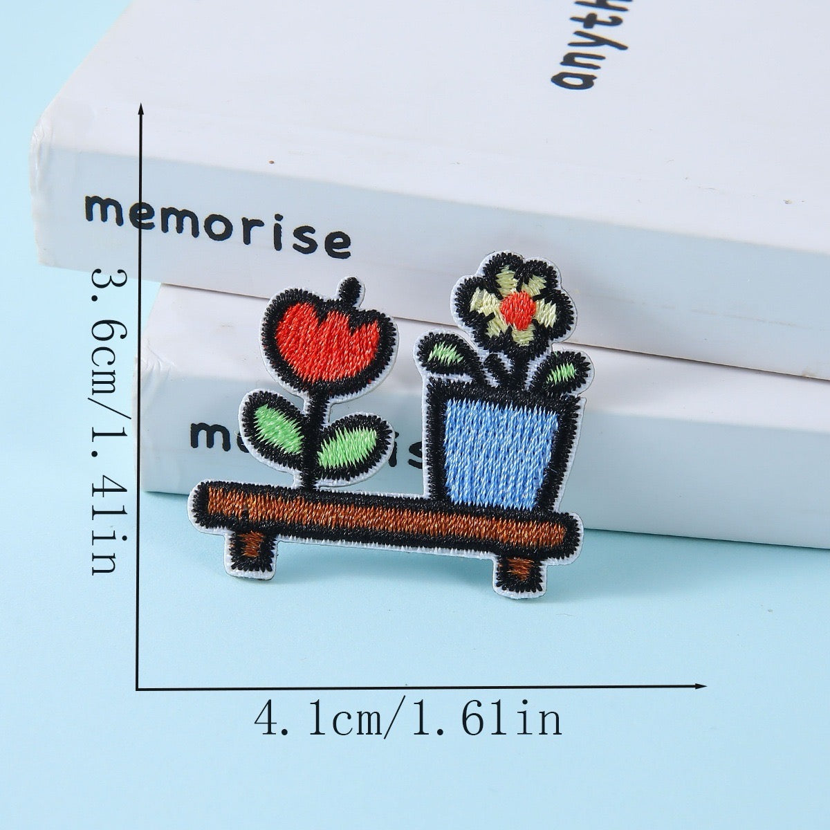 potted flowers on wooden shelf embroidered stick-on patch — red heart bloom and white daisy