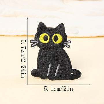 sitting upright black cat embroidered stick-on patch — large yellow-green eyes