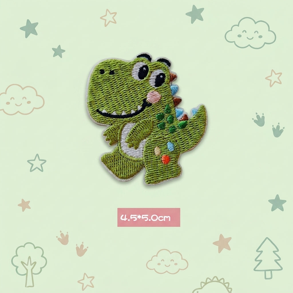 green T-Rex kawaii embroidered stick-on patch — green tyrannosaurus facing forward both arms raised wide smile bright eyes