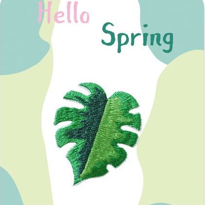 tropical leaf and monstera embroidered stick-on patches in six botanical designs — begonia caladium lotus monstera arrowhead and calathea