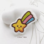 shooting star embroidered stick-on patch — yellow smiling star with rainbow coloured trail no bunny pure motion and colour
