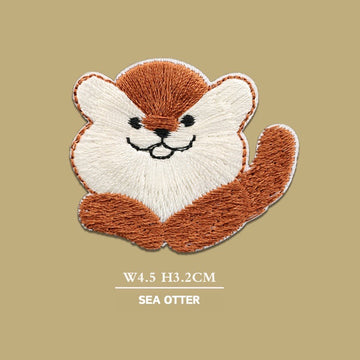 sea otter floating smiling critters embroidered stick-on patch