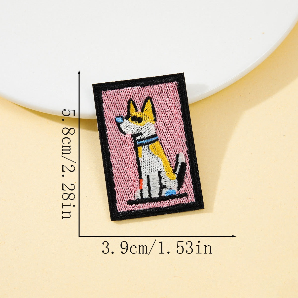 pointy ear akita retro pop art embroidered stick-on patch on pink background