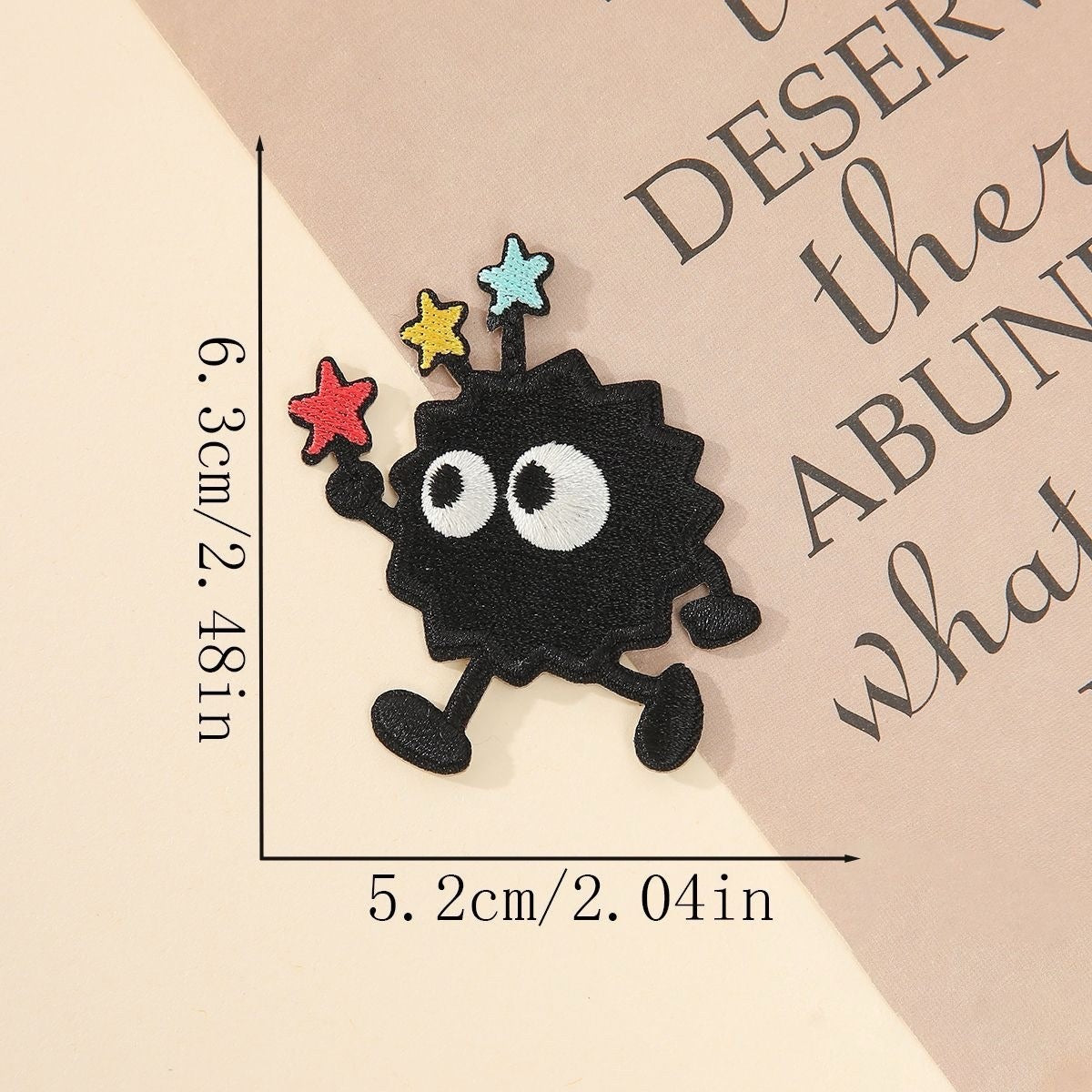 walking soot sprite embroidered patch with blue star