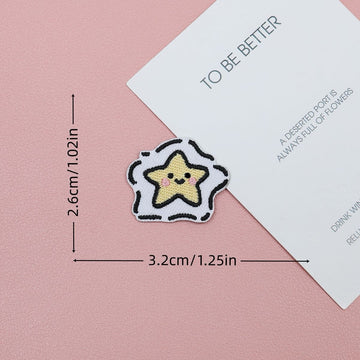 Smiling yellow star embroidered stick-on patch surrounded by a white cloud-like outline
