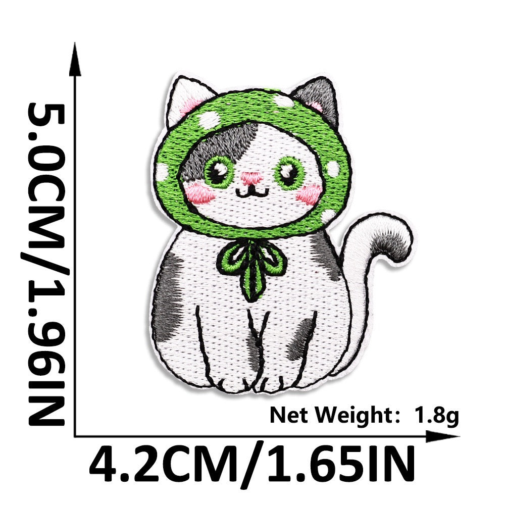 spotted cat in green polka dot bonnet embroidered patch
