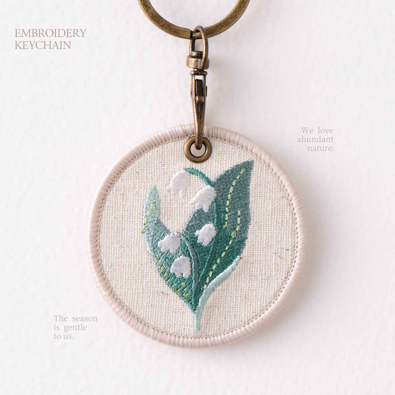 lily of the valley botanical double-sided embroidered keychain charm