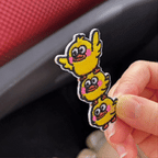 animated peel and stick demo of triple stacked ducks quirky embroidered patch applied to car center console