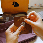 animated gif showing peel and stick application of vintage coffee grinder embroidered patch