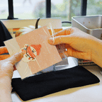 peel and stick application demo of fluffy snowman cute winter embroidered patch