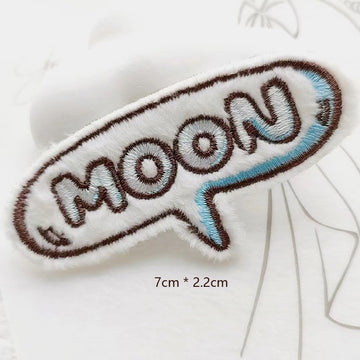 moon speech bubble embroidered stick-on patch — talk bubble shape with MOON in silver embroidered lettering