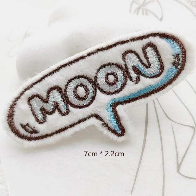 moon speech bubble embroidered stick-on patch — talk bubble shape with MOON in silver embroidered lettering