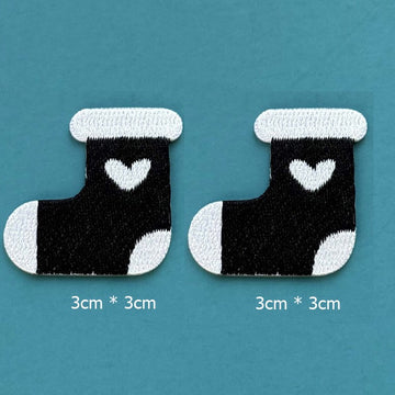 black heart stocking embroidered stick-on patches — pair of black stockings with white cuff white heart motif and white toe 30x30mm