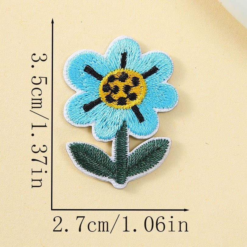 spotted blue bloom googly eyes embroidered stick-on patch