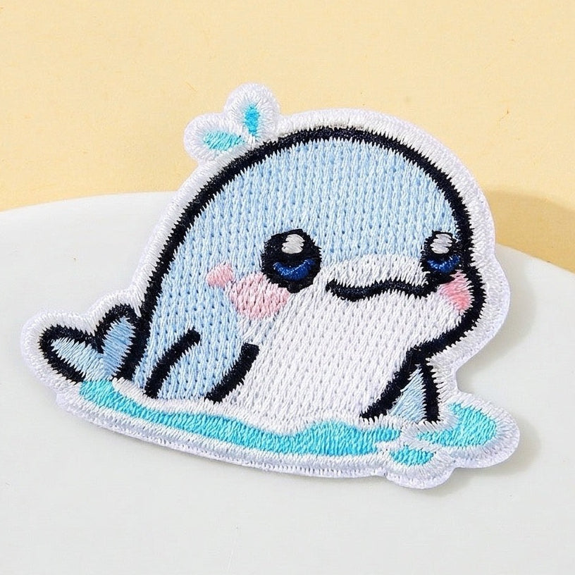 surfing dolphin kawaii embroidered patch close-up detail