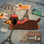 brown dachshund with red beret and pink scarf french beret wiener dog embroidered patch poster